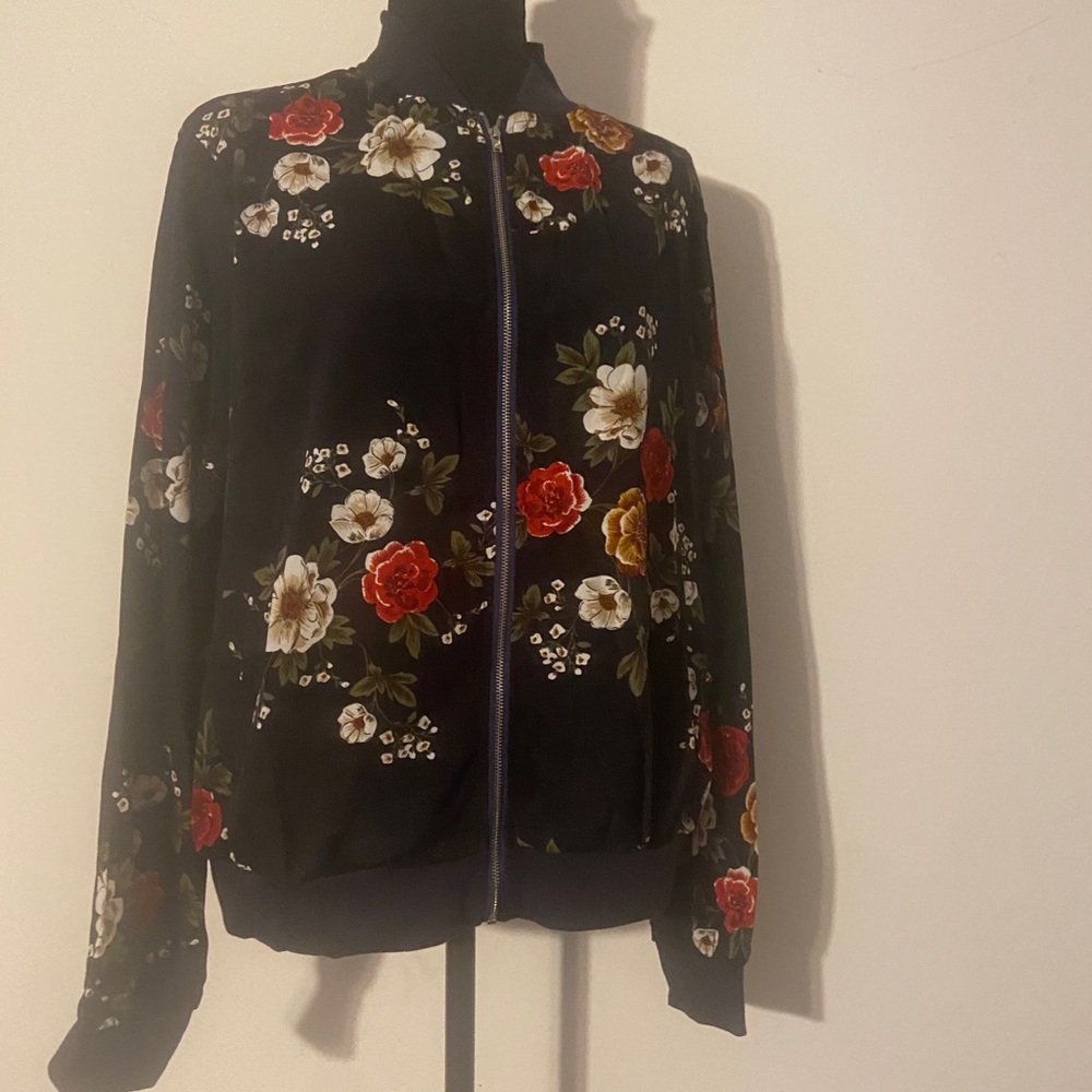 Sheer flowered zip up light weight jacket elastic at waist and cuffs